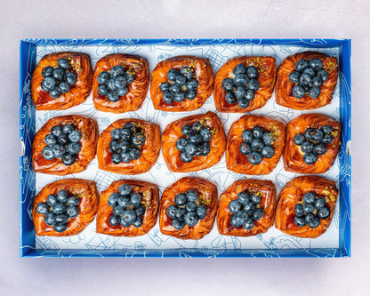 A Box of Bakehouse Occasions mini blueberry danish, prefect for afternoon treats and event catering.