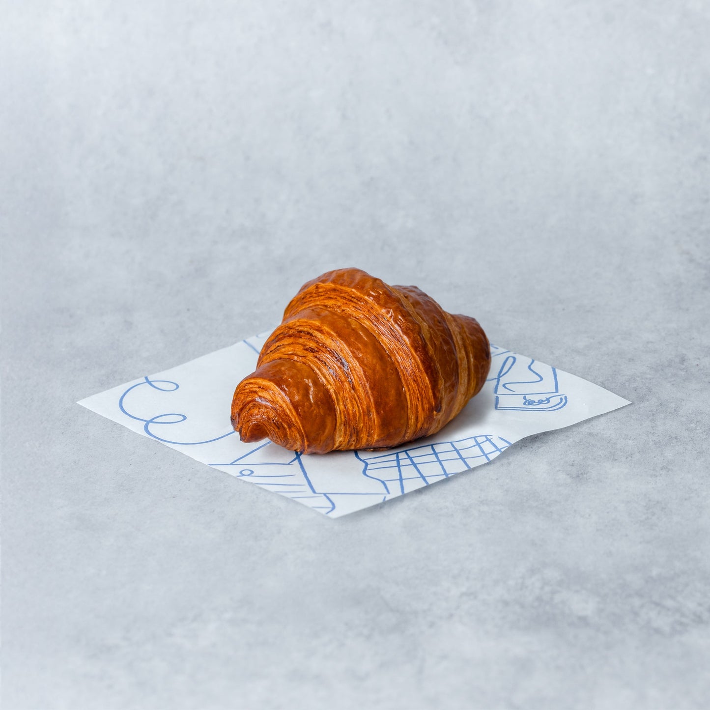 A flaky buttery Bakehouse mini croissant