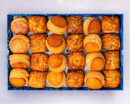 Bakehouse Occasions offers a catering scone box with selection of plain, apple raisin, and cheese & onion scones.