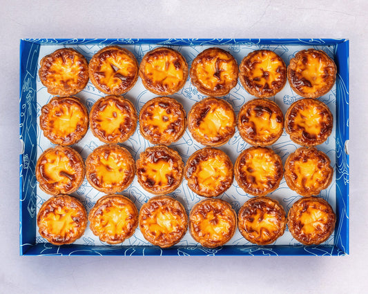 A box of Bakehouse signature sourdough egg tart, available for online order, catering, and party.